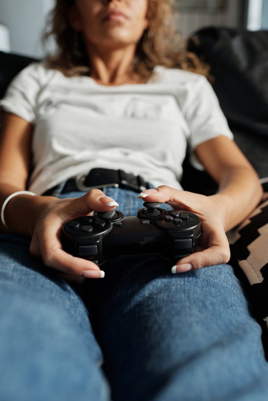 photo of woman playing videogame